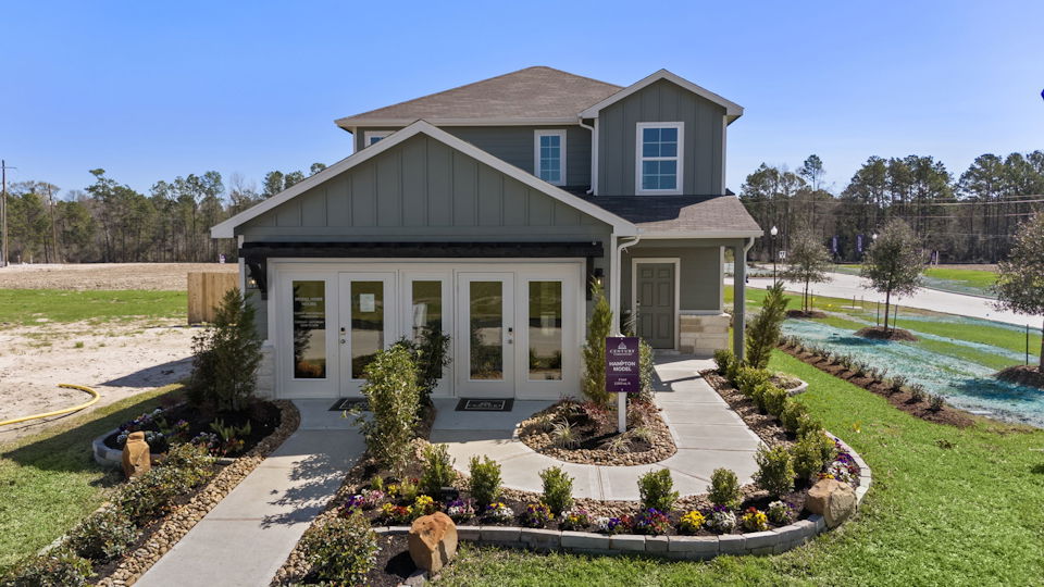 A house with a large front yard.