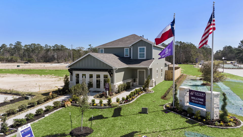 A house with flags in front.