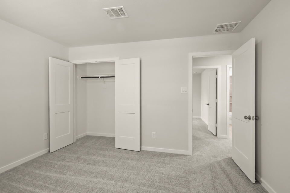 A room with white doors.