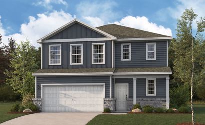 A grey house with a garage.