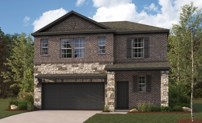 A brick house with a garage.