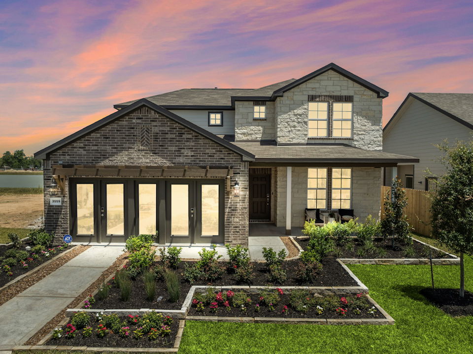 A house with a large front yard.