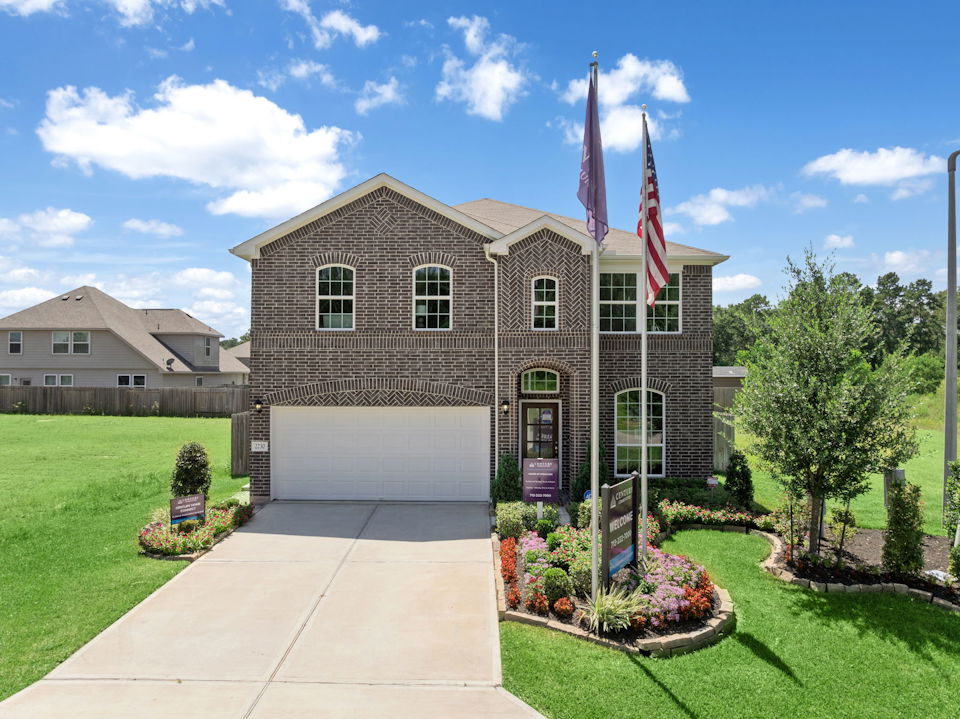 A building with flags on the front.