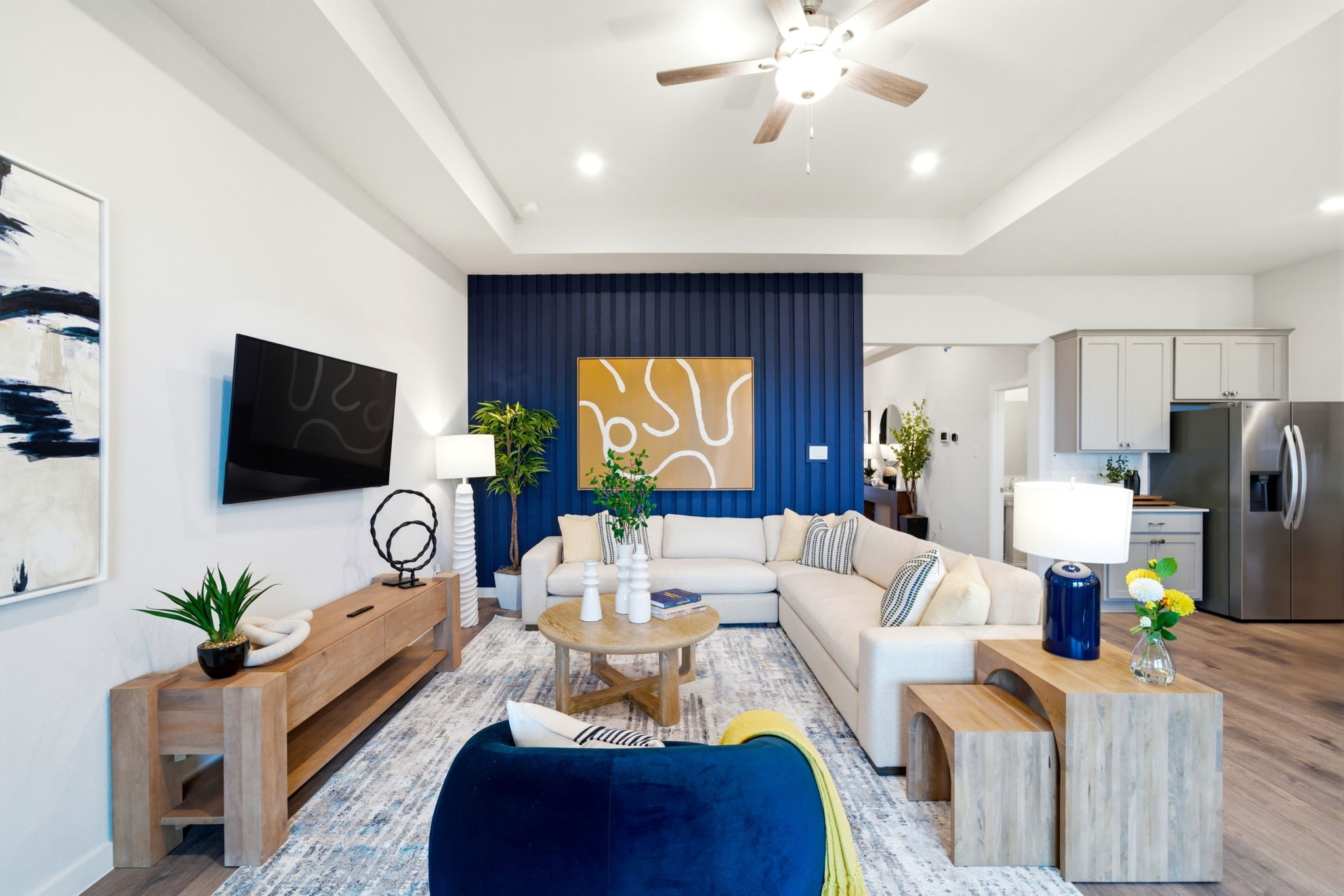 A living room with a couch and a table.