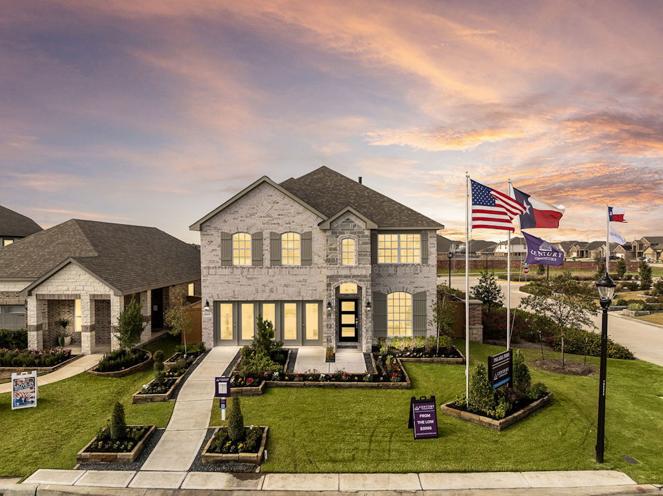 A house with flags in the front.