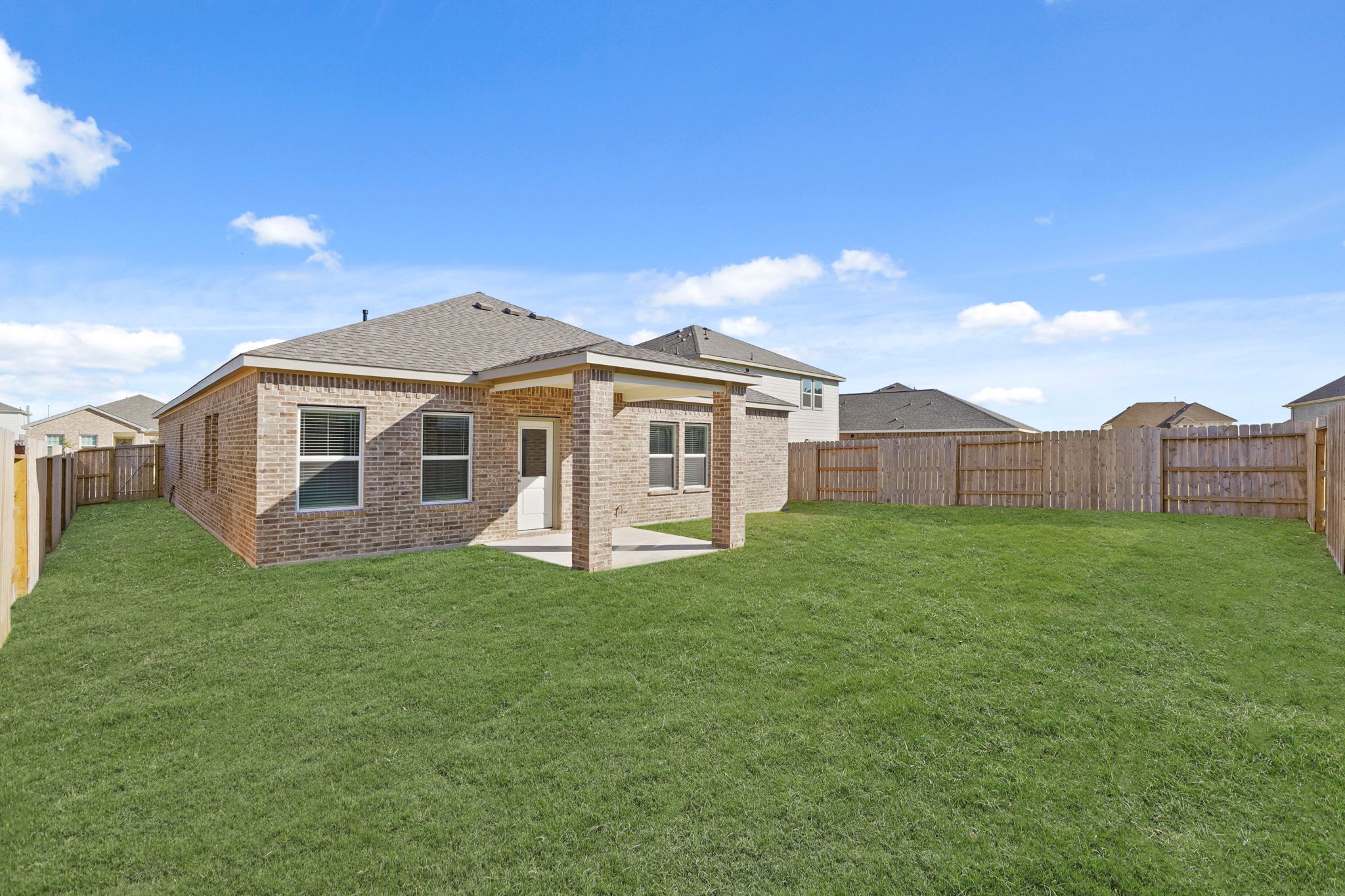 A house with a fence around it.
