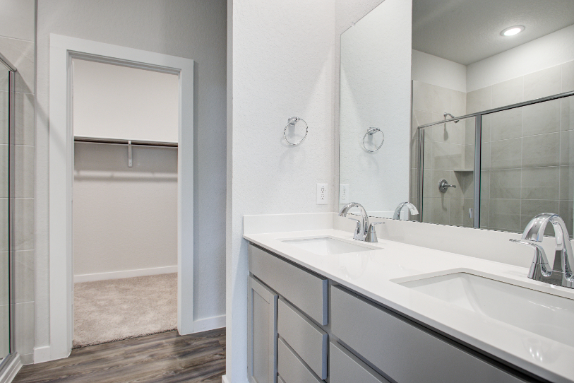 A bathroom with a glass shower.