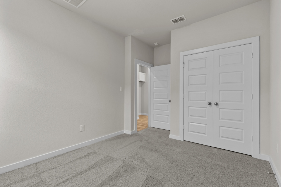 A room with white doors.