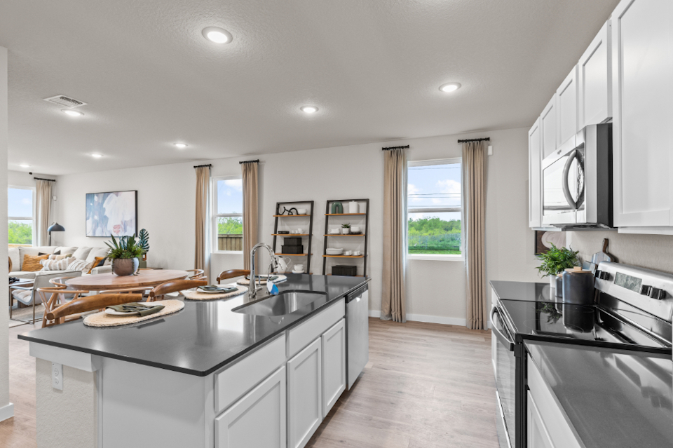 A kitchen with a large island.