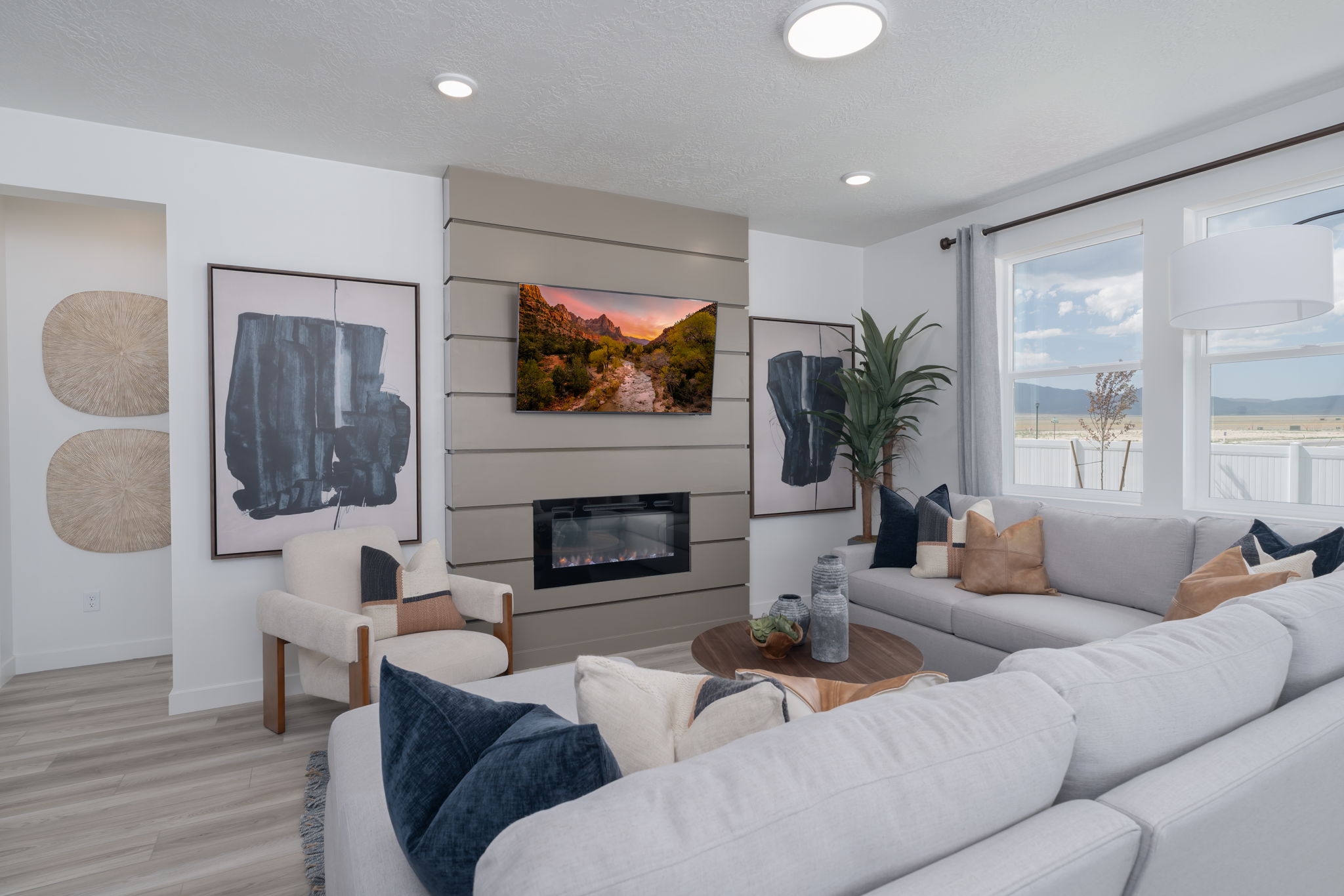 A living room with a fireplace.