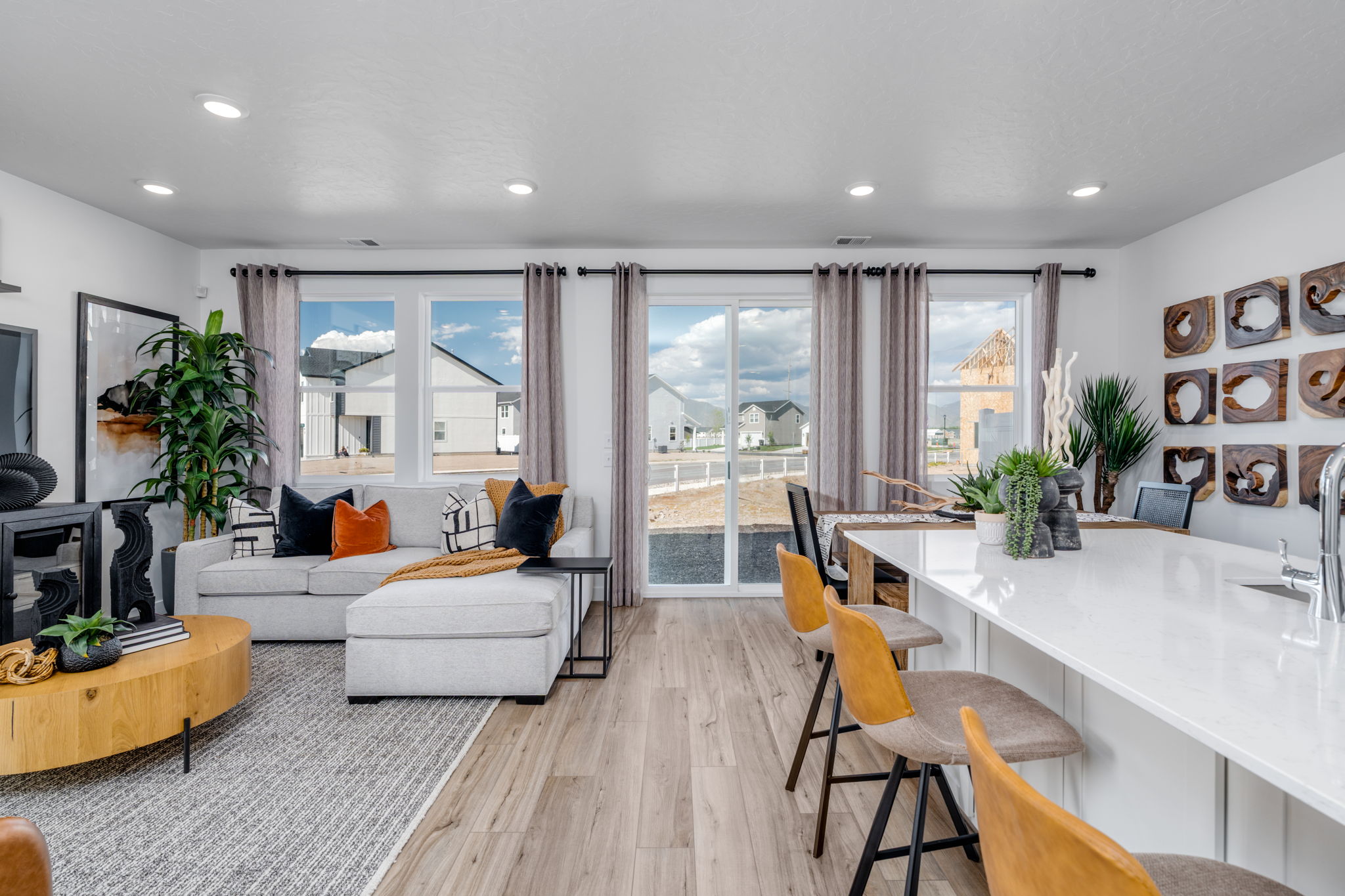 A living room with a large window.