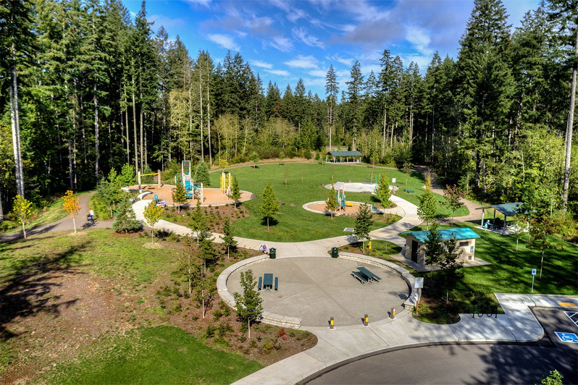 A park with trees and a swimming pool.