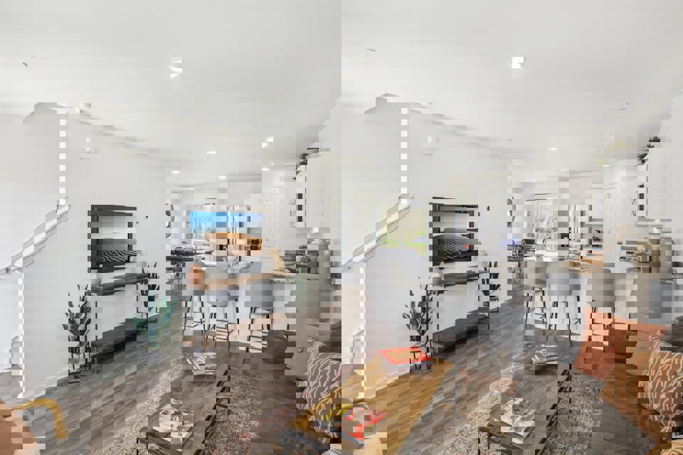 A living room with a tv and couches.