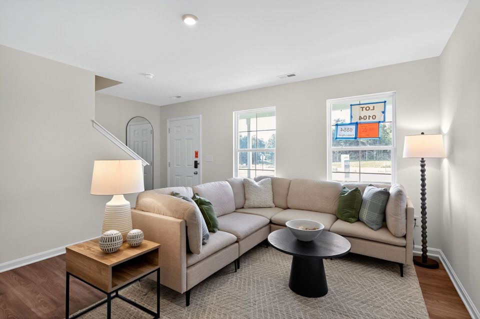 A living room with a couch and a coffee table.