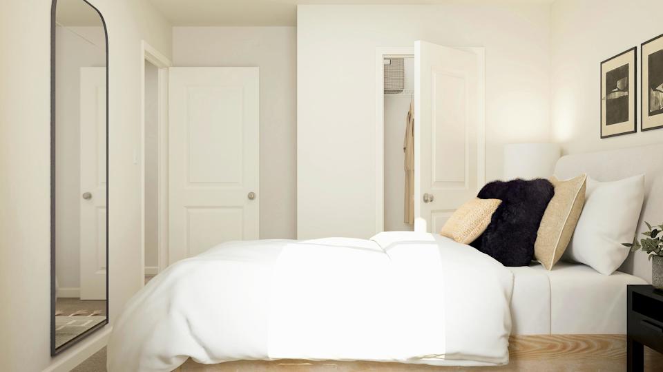 A white couch in a room.