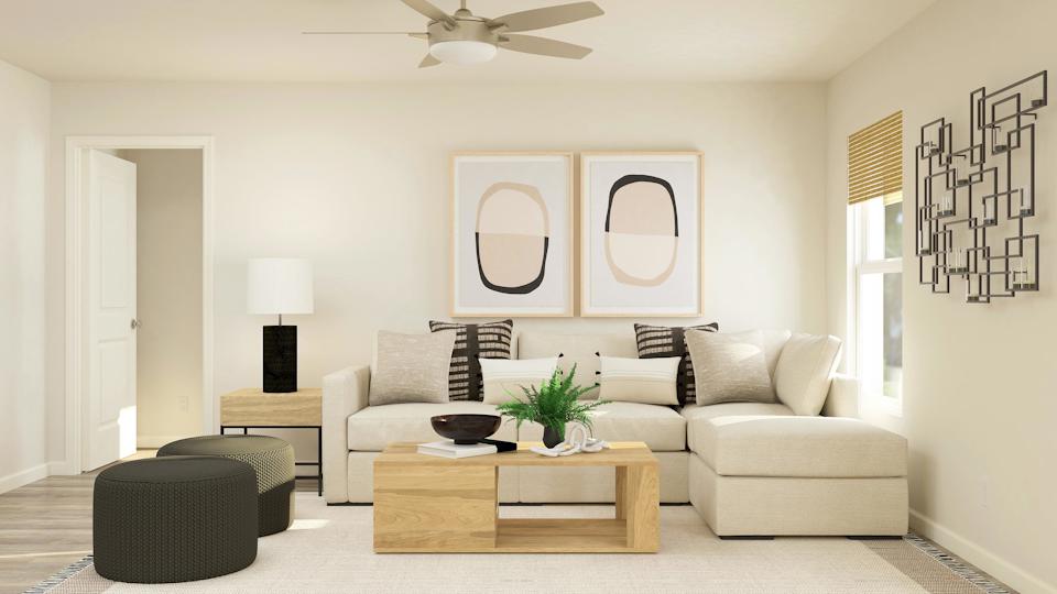 A living room with a couch and a coffee table.