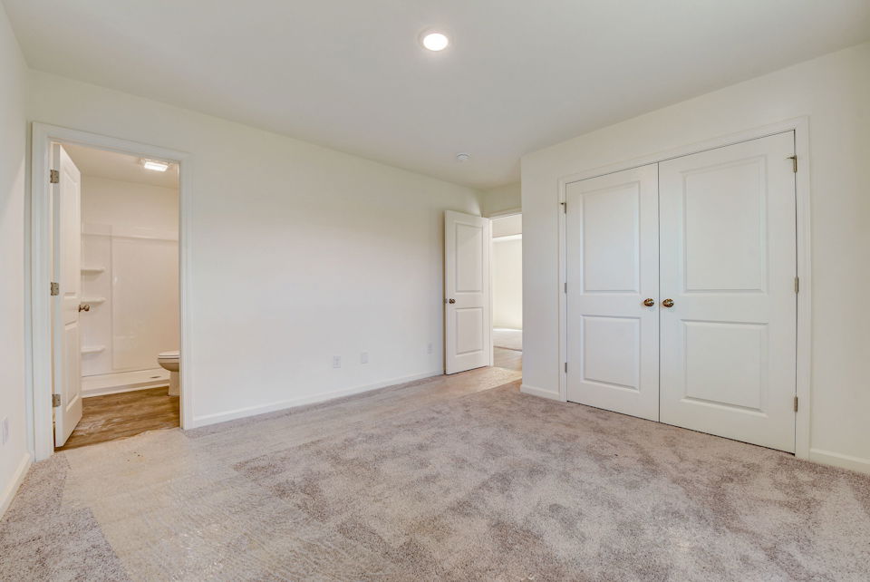A room with white doors.