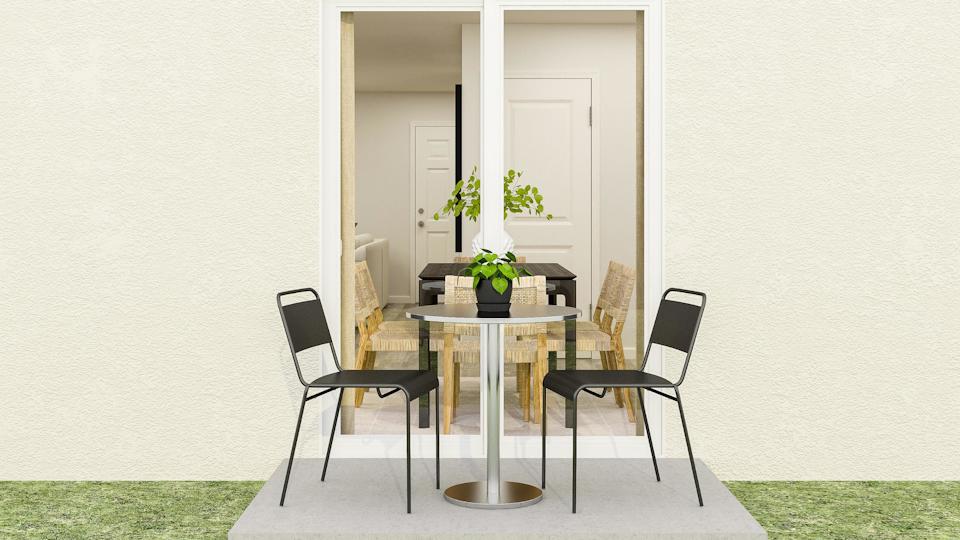 A table with chairs around it.