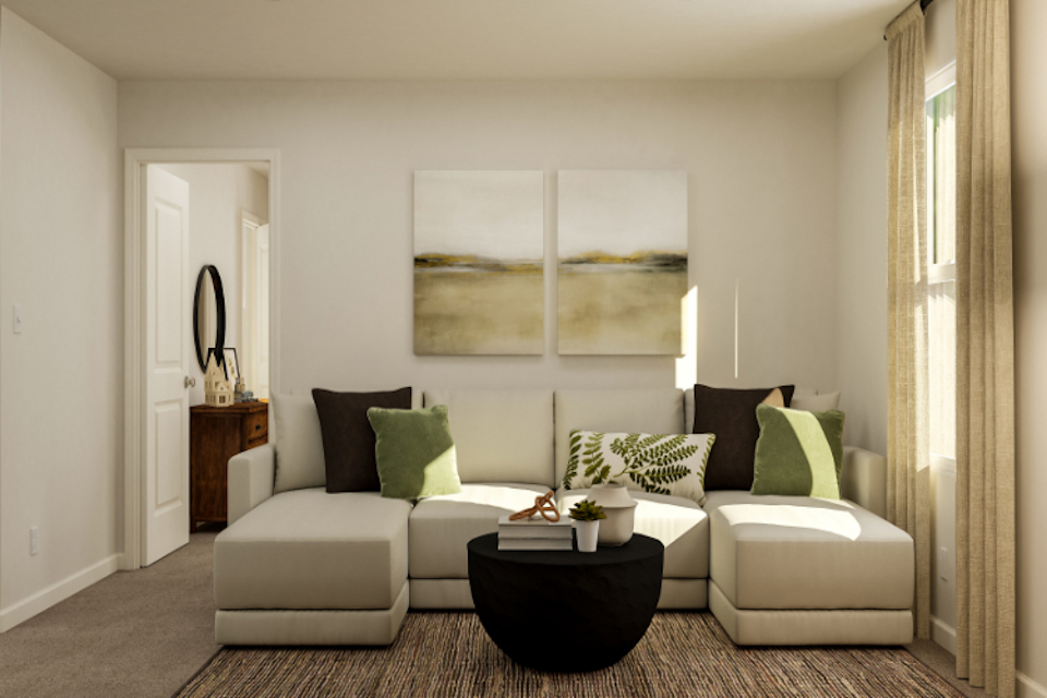 A living room with a couch and a coffee table.