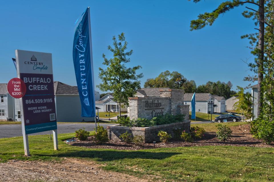 A sign in front of a building.